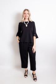 Zee SOLID BELL SLEEVE KNIT TOP ROUND NECK  and Single Pearl in Black by LIOR