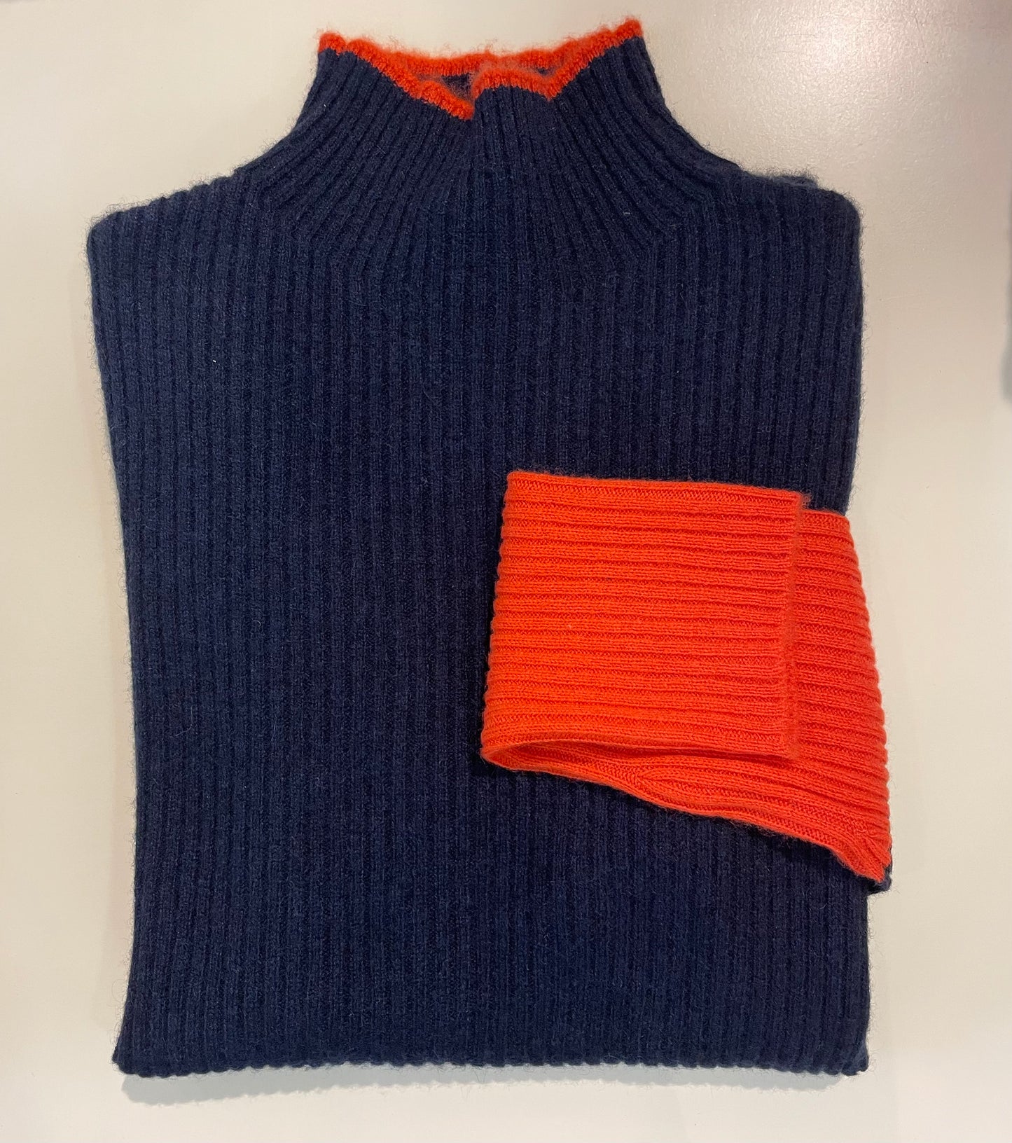 Mock Neck Cashmere Sweater in Orange with Navy Tipped Neck and Navy Sleeve Contrast